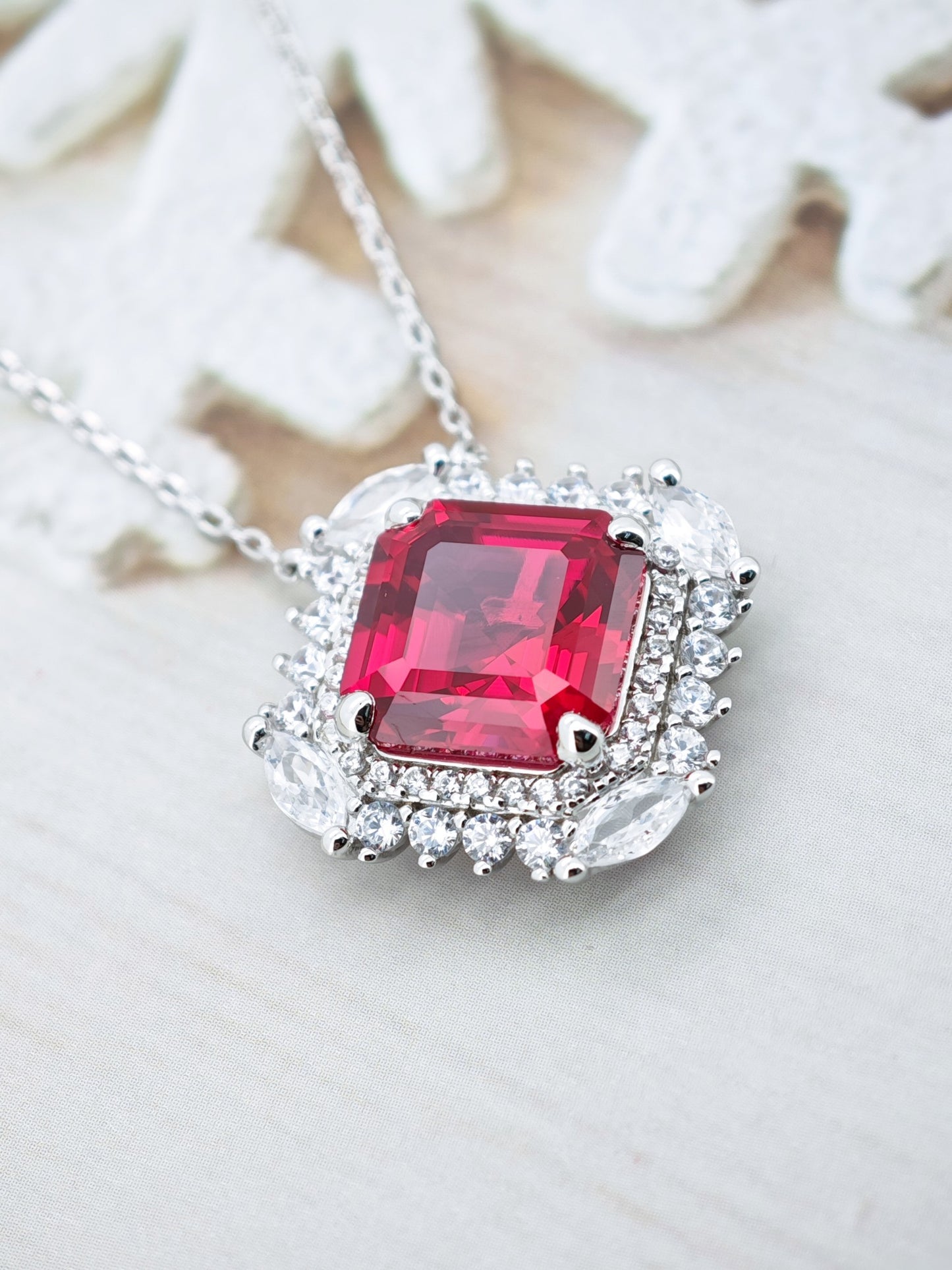 Certified S925 STERLING SILVER SETTING LAB MADE RUBY PENDANT.
