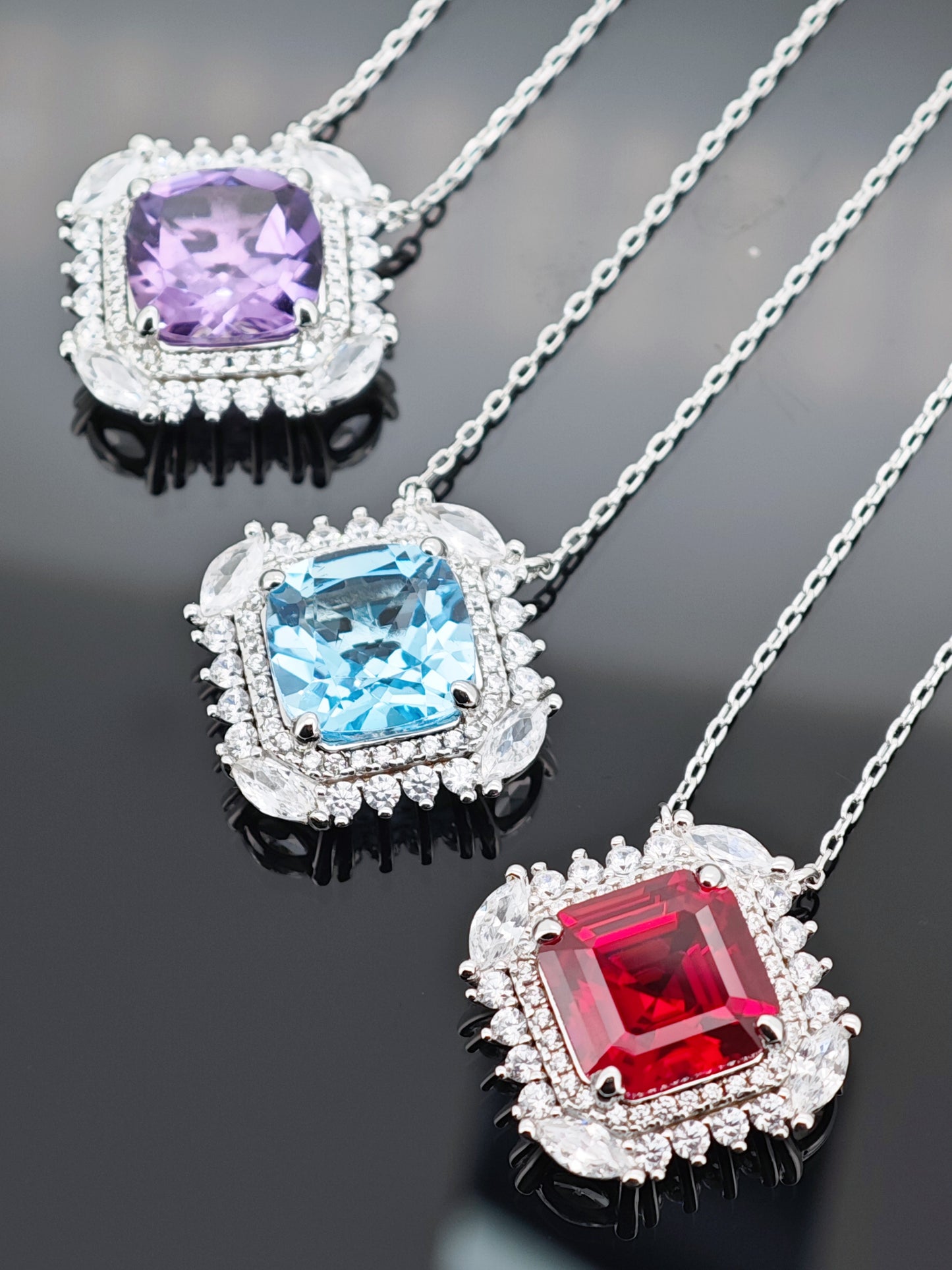 Certified S925 STERLING SILVER SETTING LAB MADE RUBY PENDANT.