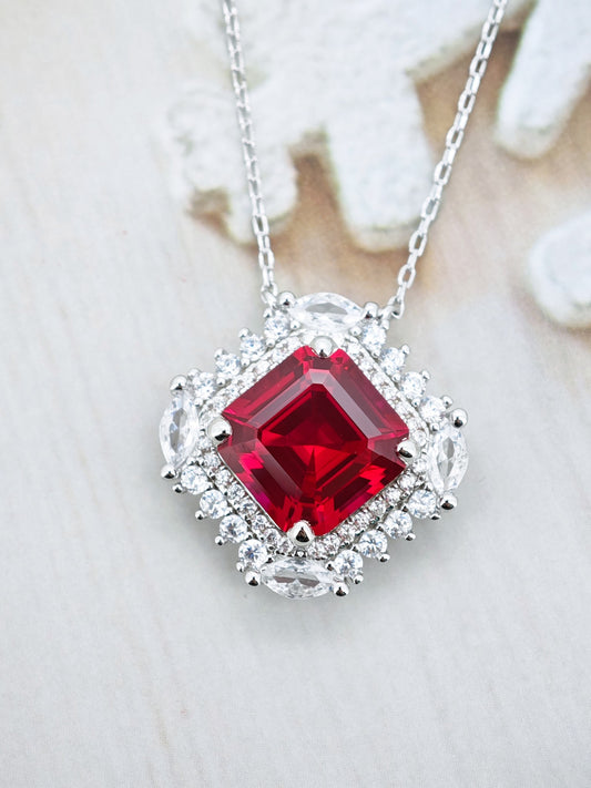Certified S925 STERLING SILVER SETTING LAB MADE RUBY PENDANT.